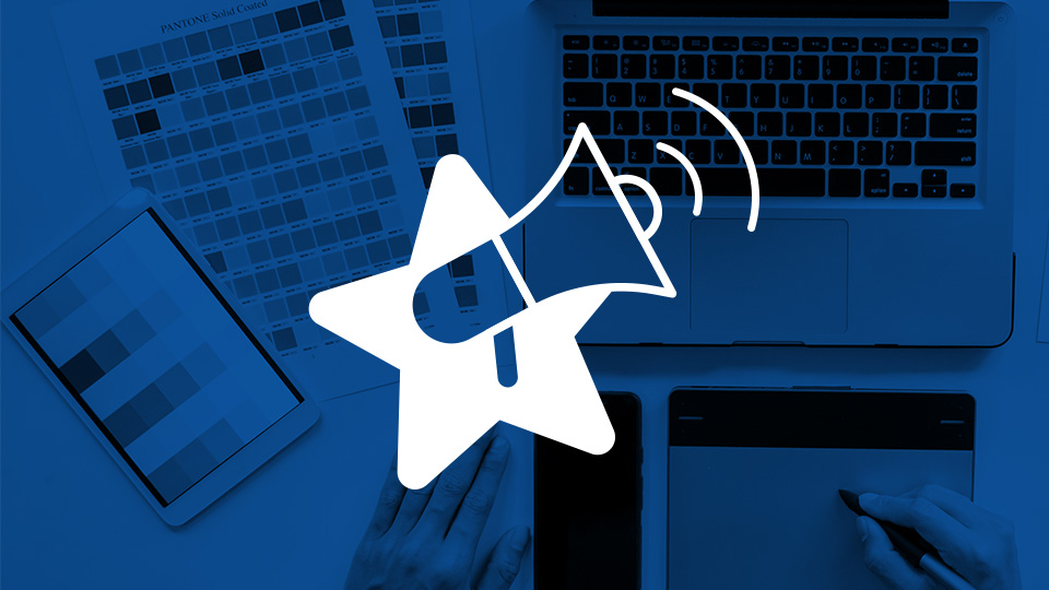 Megaphone over color palletes representing branding for businesses